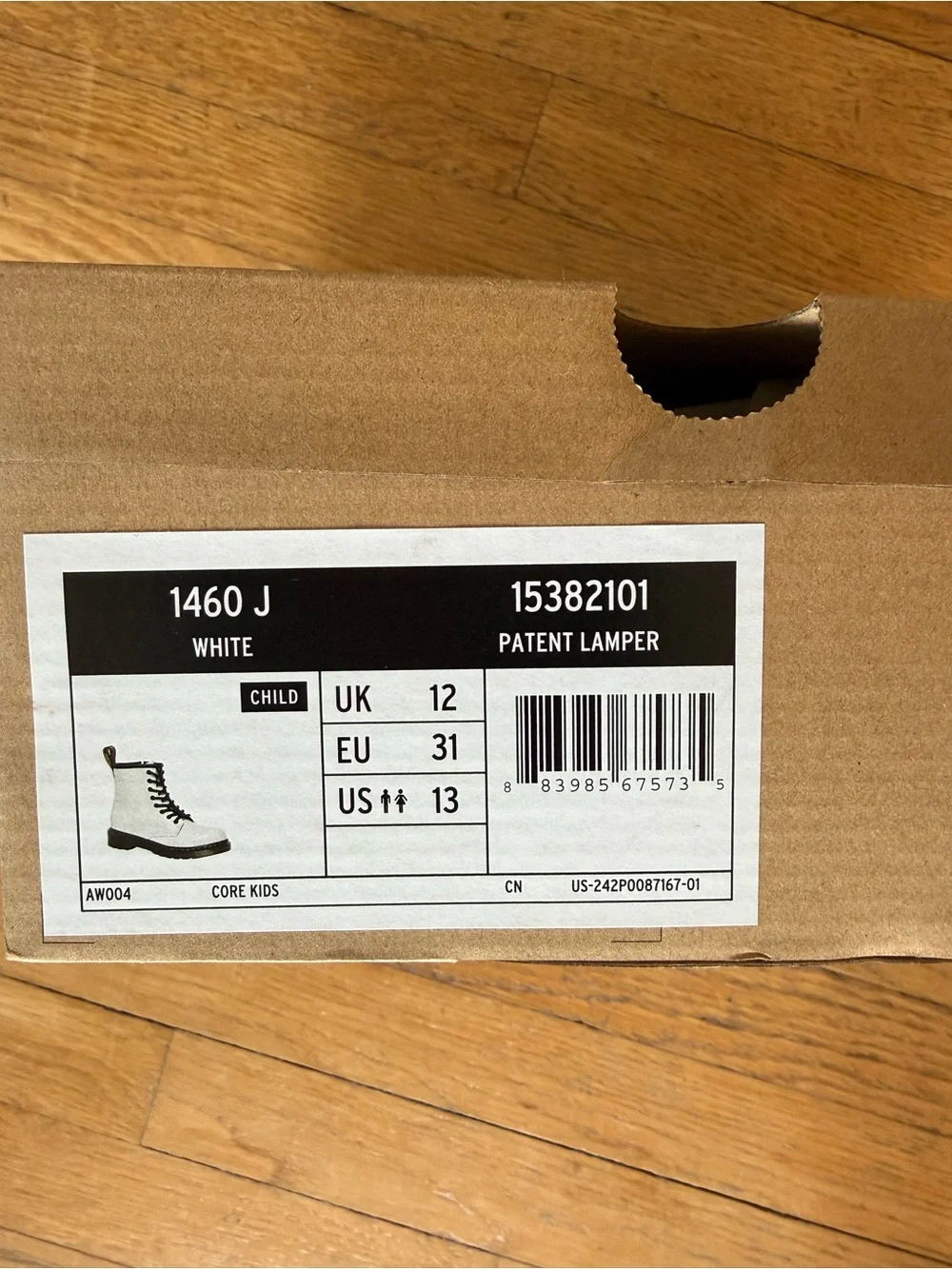 Dr. Martens White Patent Kids Lace-Up Ankle Boots with Black Trim